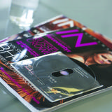 Self-adhesive CD Pocket with Finger Hole